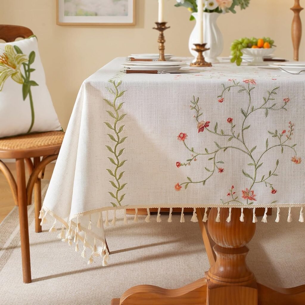 How to set a Beautiful Easter Table spring tablecloth light colored with tassel fringe and embroidered flowers with green vines